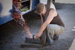 Tracey cuts steel at Adren's place